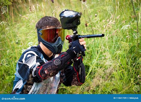 Paintball shooter stock image. Image of background, kill - 11841709