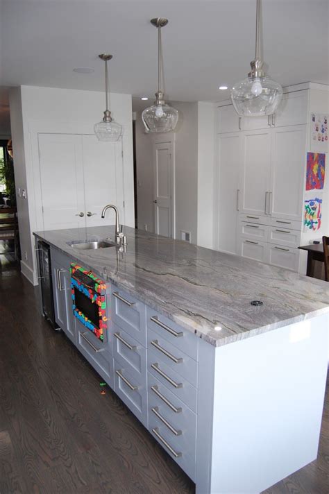 This kitchen island is 10 feet long and packs a wallop of functionality. Wine refrigerator ...