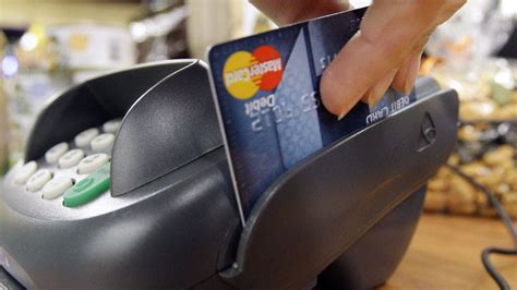 Credit card swipe fees burden owners of small businesses