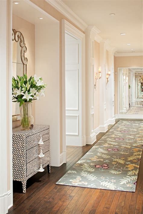 Cream hallway | Hallway decorating, Foyer decorating, Narrow hallway