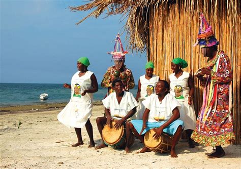 Garifuna, the mixed race descendants of African slaves exiled by the British after revolts ...