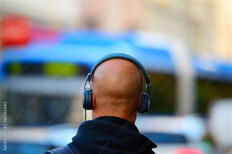 Head in silhouette with headphones Stock Photo | Adobe Stock