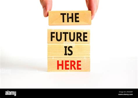 The future is here symbol. Concept words The future is here on wooden block. Beautiful white ...