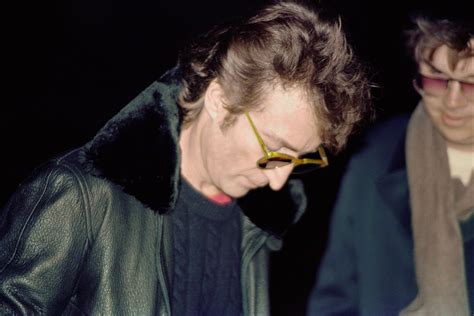 John Lennon signing his autograph for a fan (12/8/1980) : r/beatlescirclejerk