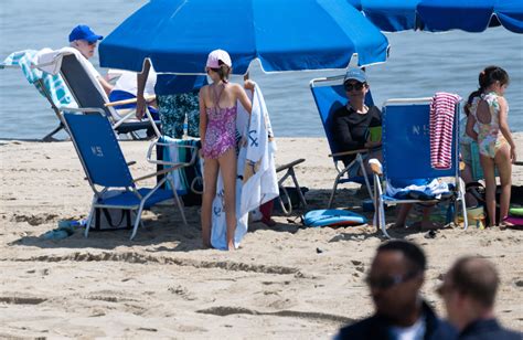 Joe Biden soaks up with the sun with First Lady Jill Biden near Delaware home after rough work week