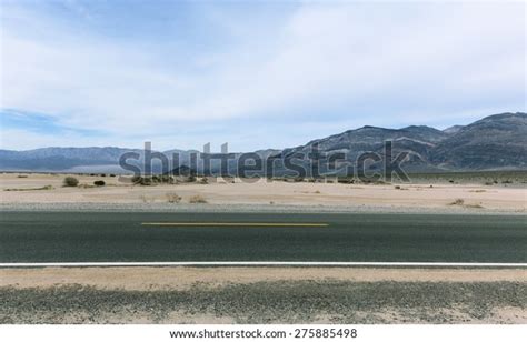 Horizontal Paved Road Desert Striped Mountains Stock Photo (Edit Now) 275885498