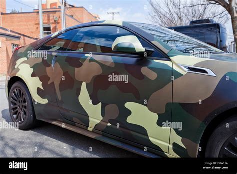 Car with military camouflage pattern wrap - USA Stock Photo - Alamy