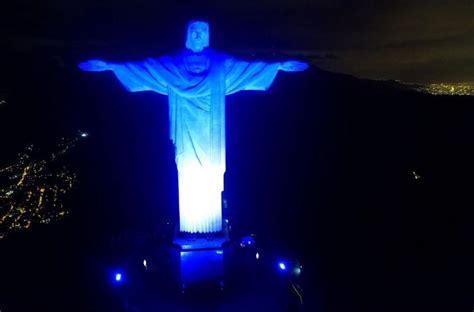 Brazil's Christ Redeemer statue illuminated in blue and white for ...