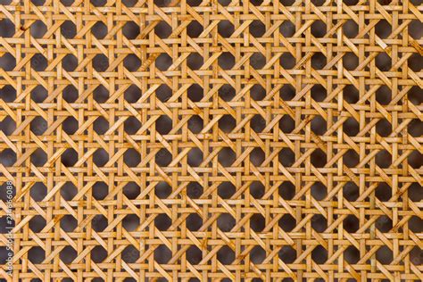 Close up of the pattern formed by open weave rattan cane Stock Photo | Adobe Stock