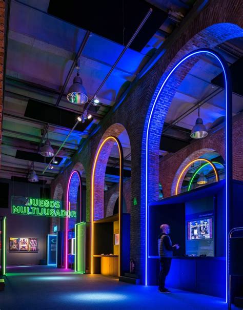 Game On's neon-filled exhibition design pays homage to 80s video games ...