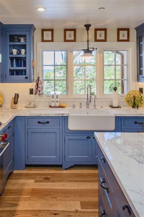 Stylish Shaker Blue Cabinets with White Marble Countertops