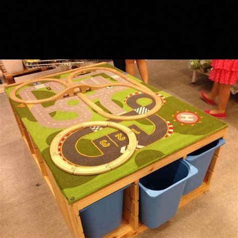 DIY rug/train table with storage bins #modeltraintablediy | Train table, Train table storage ...