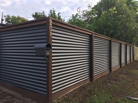 corrugated iron and hardwood fence | Metal fence panels, Corrugated ...