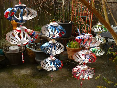 Made by Wanda at Your Healing Garden, soda pop cans made into fun decorative whirligigs for the ...