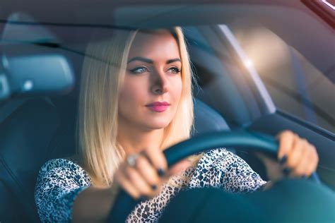 Young woman driving a car - Craw-Kan Telephone Cooperative