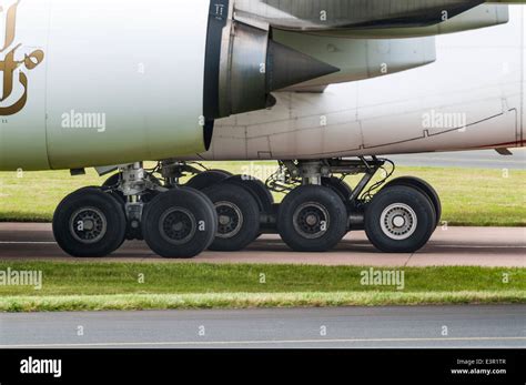 Side view of an Emirates Airbus A380 aircrafts engines and landing gear ...