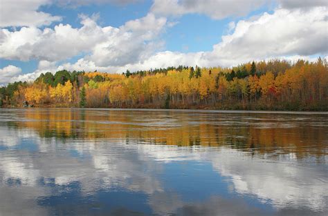 Saguenay River Reflection Of The Sky Photograph by Buzbuzzer | Fine Art America