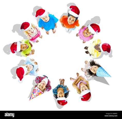 Kids with christmas hats Stock Photo - Alamy