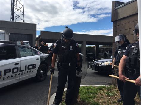 Another crowd has grown outside the Schenectady Police department ...