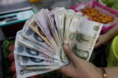 China's Currency Slides After Beijing Announces Devaluation - NBC News