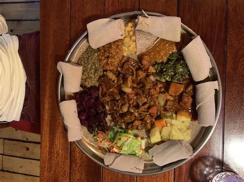 [I ate] Ethiopian, Awaze tibs, beats, lentils, and other veggies atop injera. : r/food