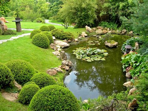 Japanese garden and pond. Beautiful japanese garden with pond and path ...