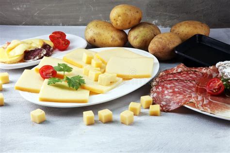 Delicious Traditional Swiss Melted Raclette Cheese on Diced Boil Stock ...