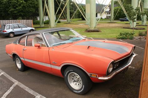 OLD PARKED CARS.: 1972 Ford Maverick Grabber.