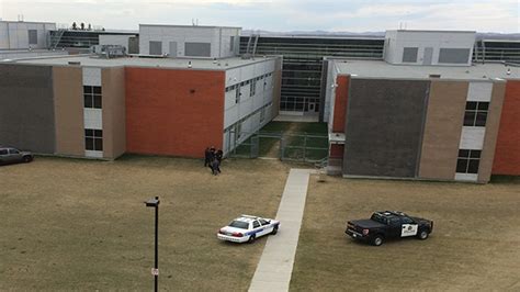 Police lock down Ernest Manning High School for weapons complaint | CTV News