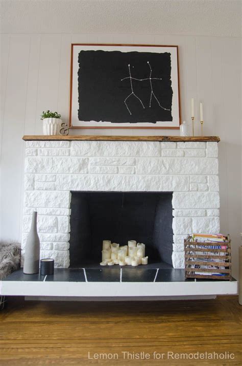 Remodelaholic | DIY Stone Fireplace Update with Live Edge Wood Mantel | Painted stone fireplace ...