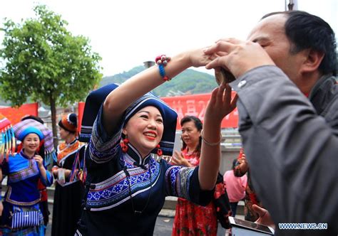 People of Zhuang ethnic group attend "hundred-family banquet" in S China - China Plus