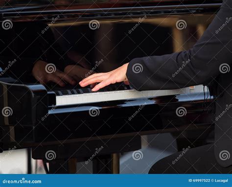 Hands of a Concert Pianist Playing a Grand Piano Stock Photo - Image of ...