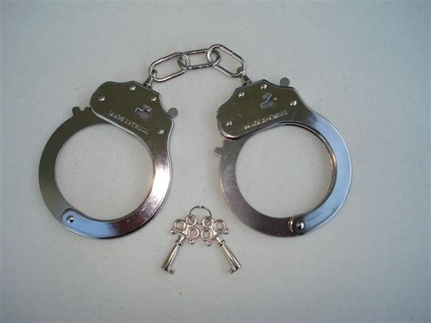 ToyGunZone - Metal Handcuffs with 2 Keys and Safety Latches, $4.99 (http://www.toygunzone.com ...