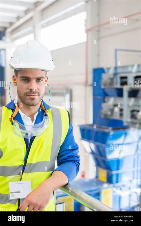 Worker in factory Stock Photo - Alamy