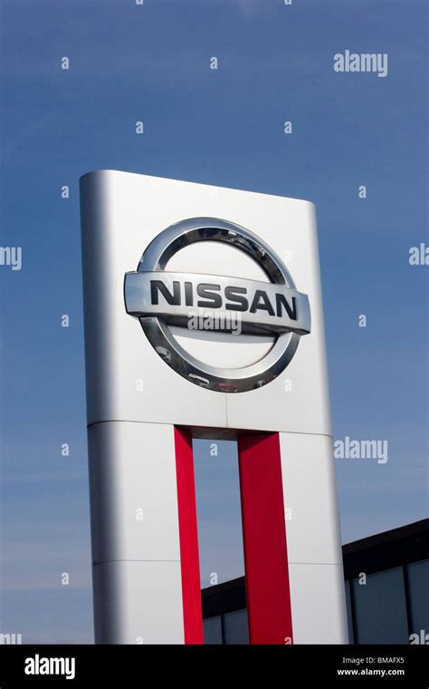 Nissan car logo on a dealership sign Stock Photo - Alamy