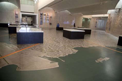 The main hall of the museum with a map of Bahrain on the floor ...