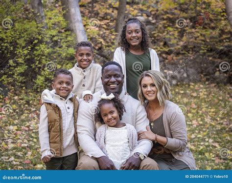 Posed Mixed Race Family Portrait Outdoors with Autumn Colors Stock Image - Image of african ...