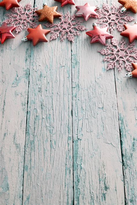 Photo of Rustic Christmas border on blue textured wood | Free christmas images