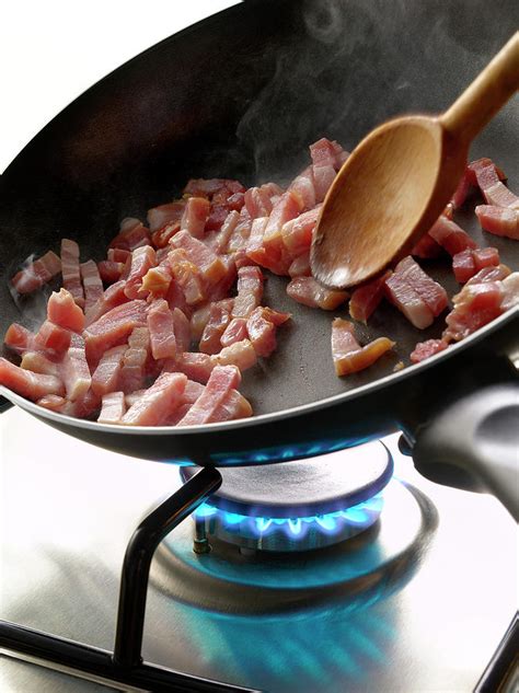 Cuisson De Lardons a La Poele Cooking Diced Bacon In A Frying Pan ...