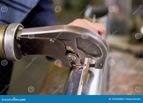 Rivet squeezer in action. stock photo. Image of laborer - 105205898