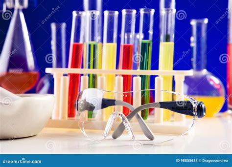 Chemistry Lab Equipment on a Table Over Blue Background Stock Image ...