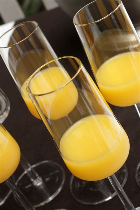 iittala Essence Champagne flutes with orange juice | Flickr
