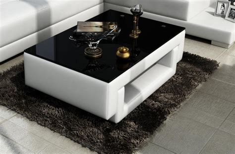 Stylish White Leather Coffee Table With Black Glass Table Top | Leather sofa living room ...