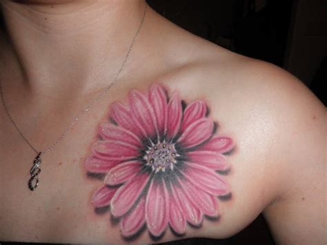 Cool pink daisy flower tattoo on chest - Tattooimages.biz