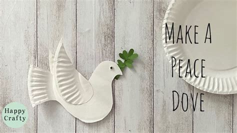 a paper plate with a bird on it and the words make a peace dove next to it