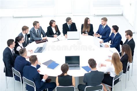 Businesspeople Sitting at Conference Round Table at the Meeting Stock ...