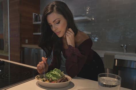 Woman Eating Salad · Free Stock Photo