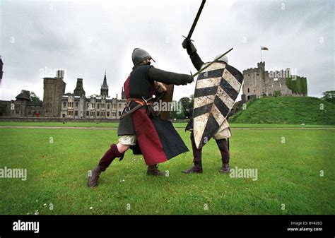 A Norman Soldier sword fight, Cardiff Castle Stock Photo - Alamy