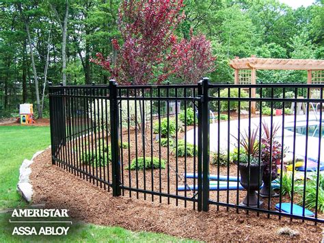 Black classic wrought iron fence and gate in backyard- Ameristar Montage fenced - Modern Design ...