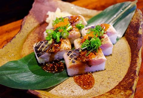 Pressed mackerel sushi at @kingyo_izakaya with sweet kelp,… | Flickr